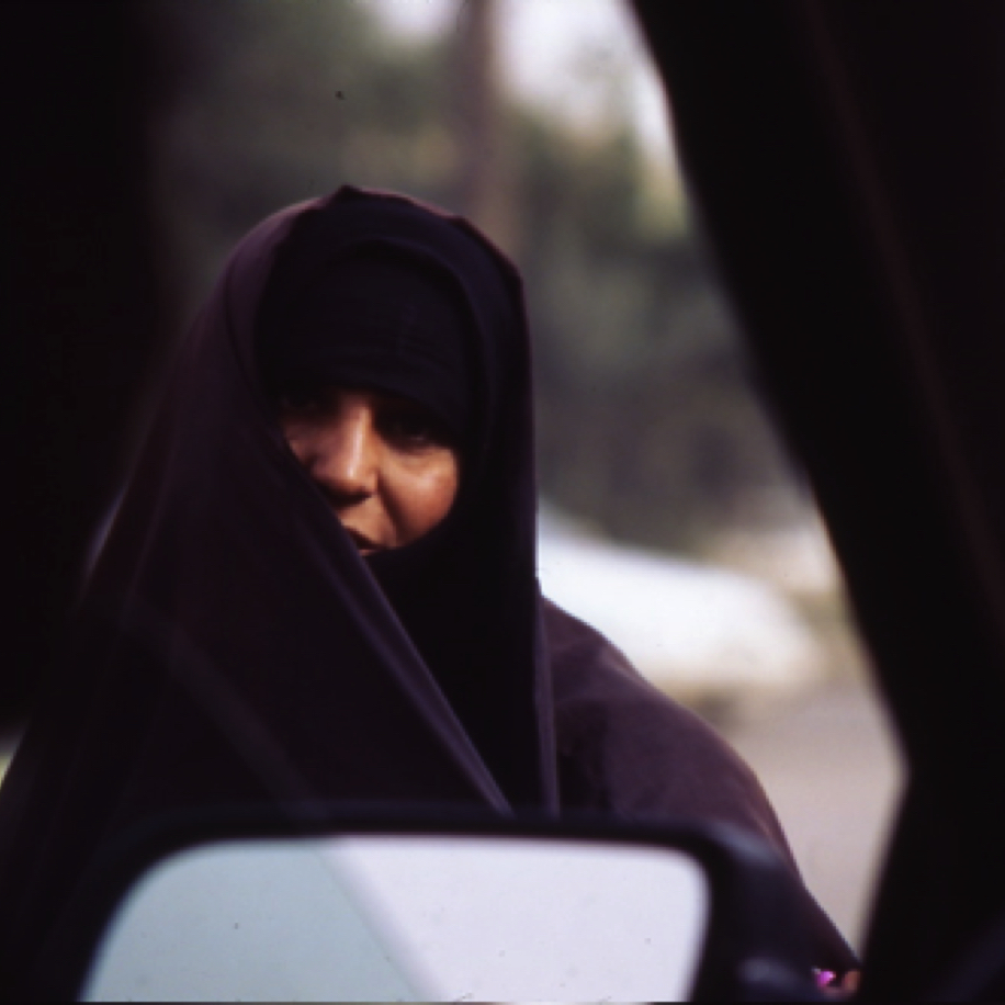 A widow begging while we were stopped  at an intersection.